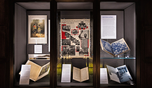 “Subjects and Objects: Slavic Collections at Yale, 1896-2022,” an exhibit at Sterling Memorial Library, explores how Yale’s Slavic collections were built. The case pictured here features materials the governments of the Russian Empire and Soviet Union used to consolidate their power over vast land areas. (Photos by Andrew Hurley)