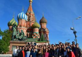 Members of the Yale Symphony Orchestra pose in front of St. Basil's Cathedral in Moscow's Red Square. (Photo by Noah Stevens-Stein)
